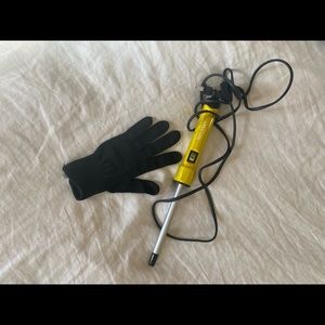 Curling iron with heat protectant glove.